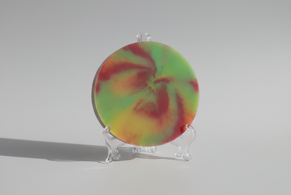 Colorful round coaster set on a stand against a gray background